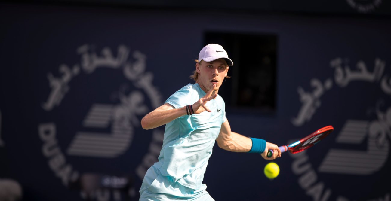 Denis Shapovalov looks at the ball and prepares to hit a forehand