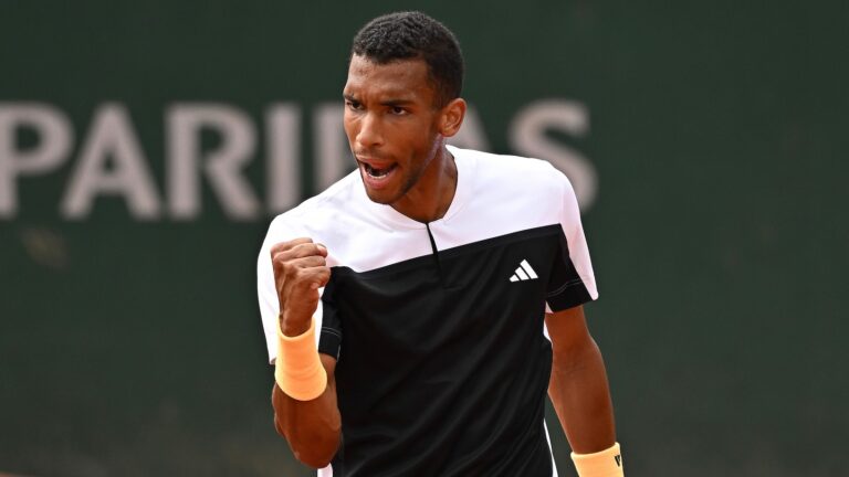 Felix Auger-Aliassime pumps his fist during his second-round win at Roland-Garros
