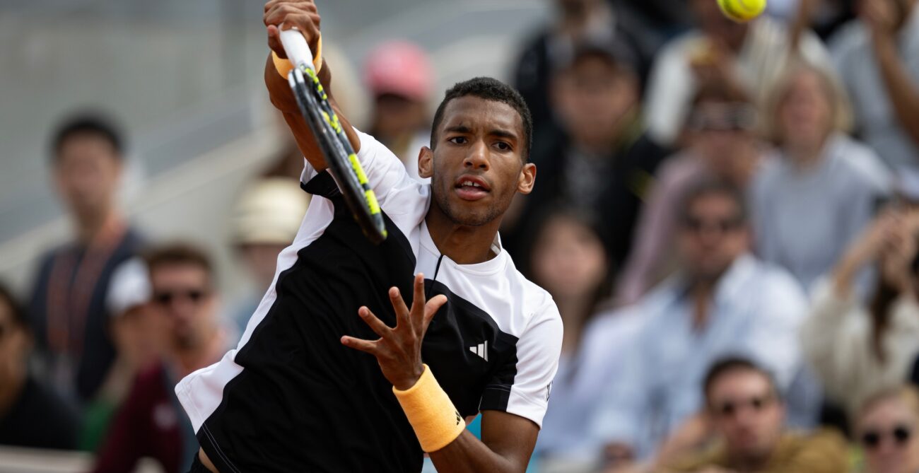 Felix Auger-Aliassime follows through on a serve during his win over Yoshihito Nishioka at the French Open.