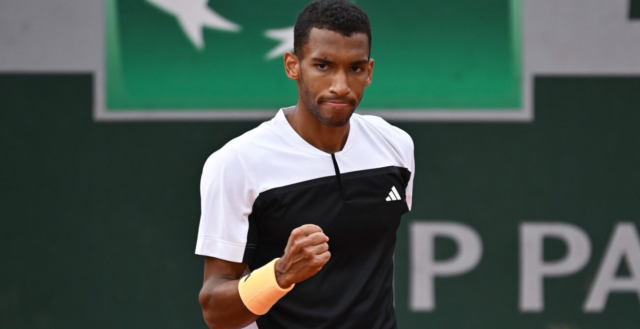 Felix Auger-Aliassime pumps his fist. He easily wrapped up his third-round win over Ben Shelton at the French Open on Saturday. Denis Shapovalov and Bianca Andreescu will also play.