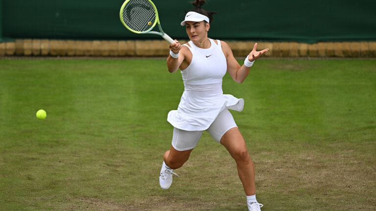 Bianca Andreescu gets low for a forehand in the second round of Wimbledon 2024
