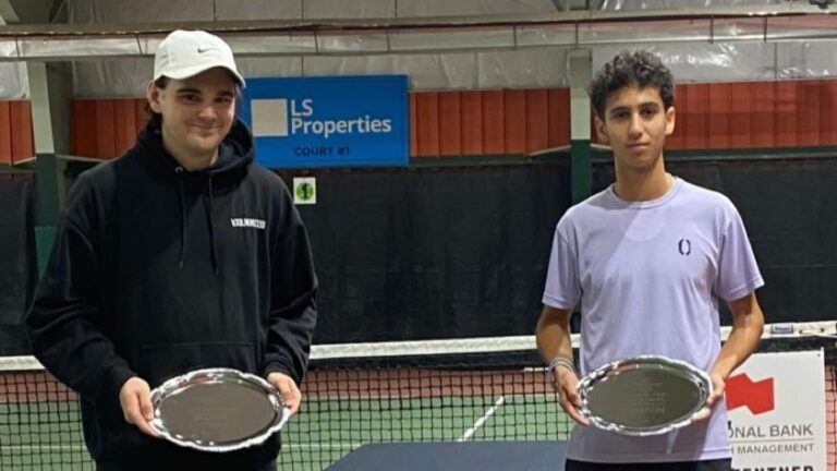 Two Canadians who won ITF Junior titles in Winnipeg hold up their trophies. Canadians also swept the titles in Kamloops.