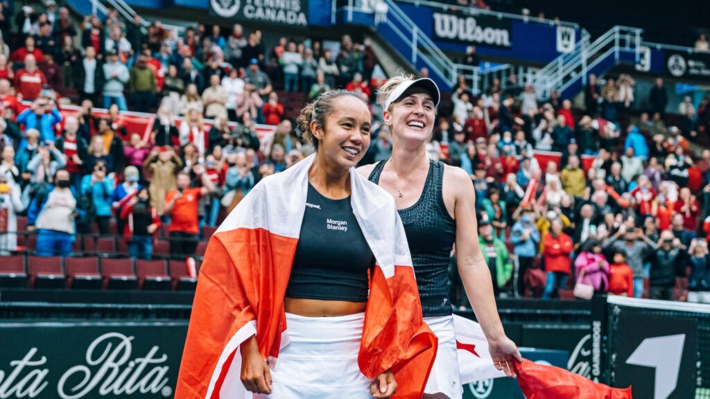 Leylah Fernandez (front) and Gabriela Dabrowski (back) smile. They are two of five Canadians competing at the Paris Olympics in tennis.