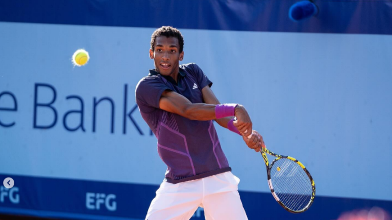 Felix Auger-Aliassime prepares to hit a backhand in Gstaad. He lost to Matteo Berrettini.