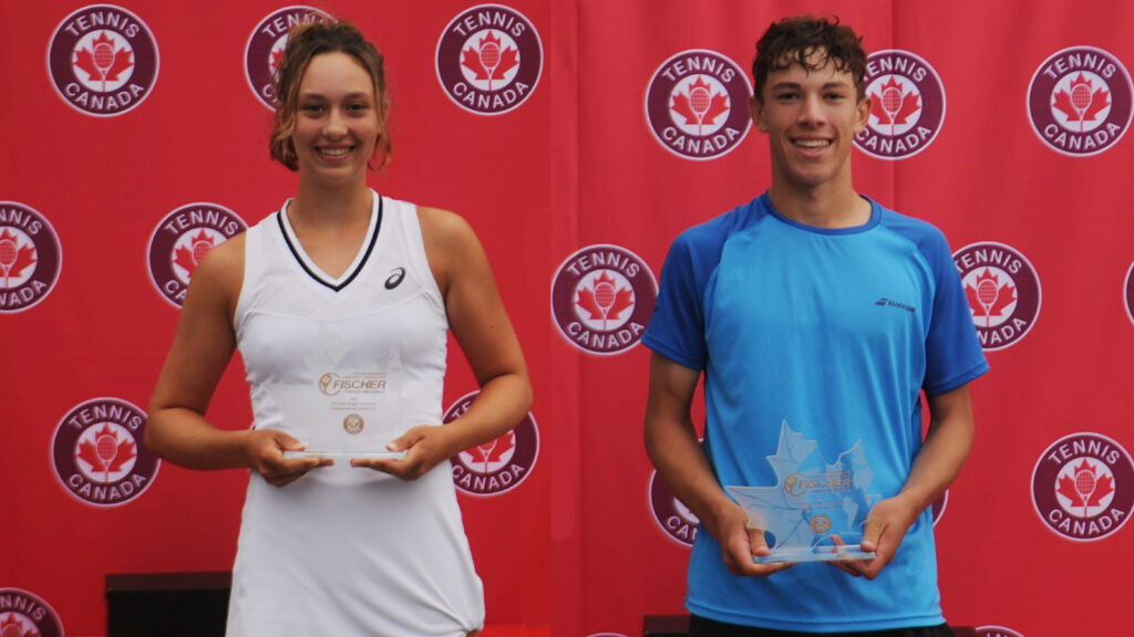 Scarlett Nicholson and Mikael Arseneault pose after winning the U18 Outdoor National Championships