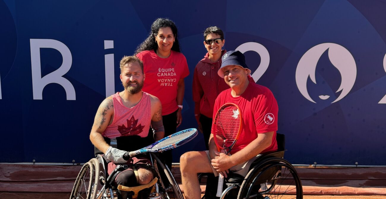 Rob Shaw (bottom left) and his team smile on court. He will play Ymanitu Silva in the first round of the Paralympics.