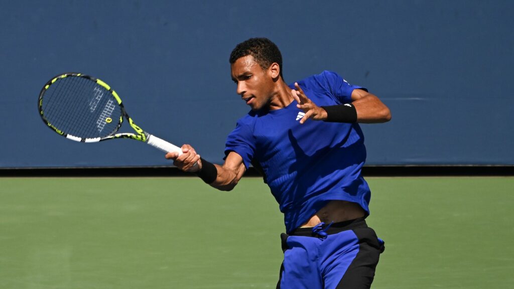 Felix Auger-Aliassime follows through on a forehand. He is competing at the Asian 1000 event in Shanghai this week.