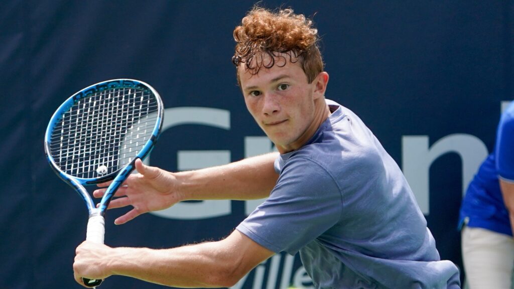 Nicolas Arseneault prepares to slice a backhand. He won the doubles title with his brother Mikael in Repentigny.