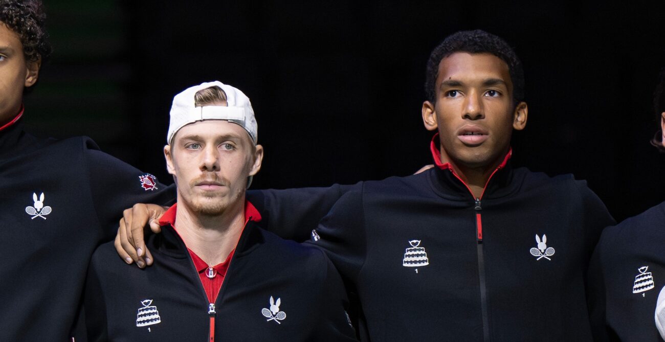 Denis Shapovalov and Felix Auger-Aliassime stand together during the national anthem at the Davis Cup.