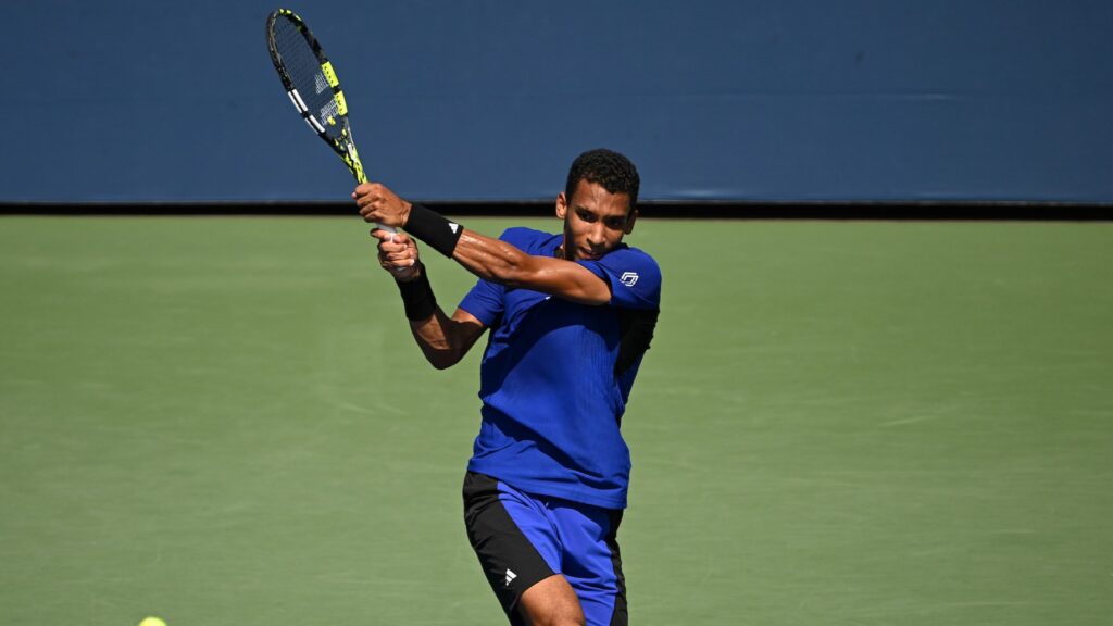 Felix Auger-Aliassime follows through on a backhand. He lost in Antwerp to Robert Bautista Agut on Friday.