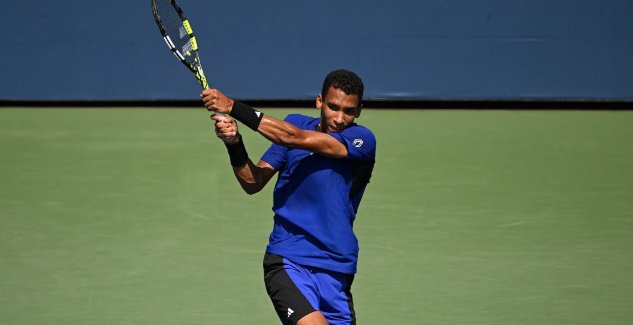 Felix Auger-Aliassime follows through on a backhand. He lost in Antwerp to Robert Bautista Agut on Friday.