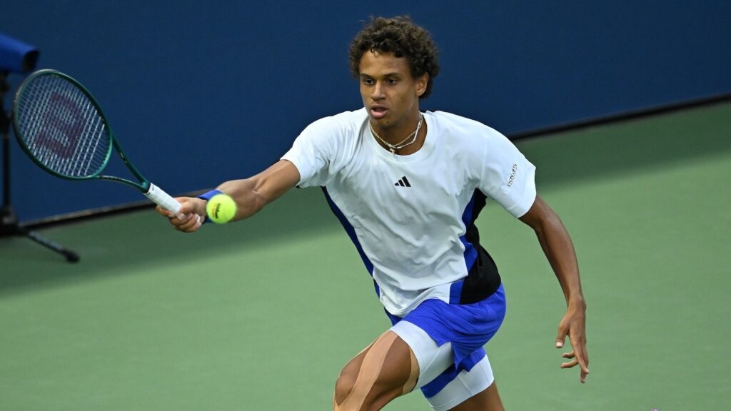 Gabriel Diallo lunges for a forehand. He lost to Karen Khachanov in the Almaty final on Sunday.