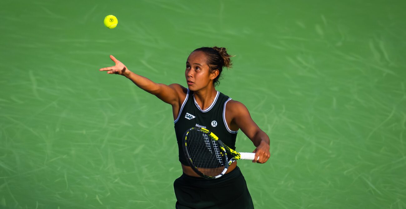 Leylah Fernadnez tosses the ball up to serve. She lost to Qinwen Zheng on Thursday in Wuhan.