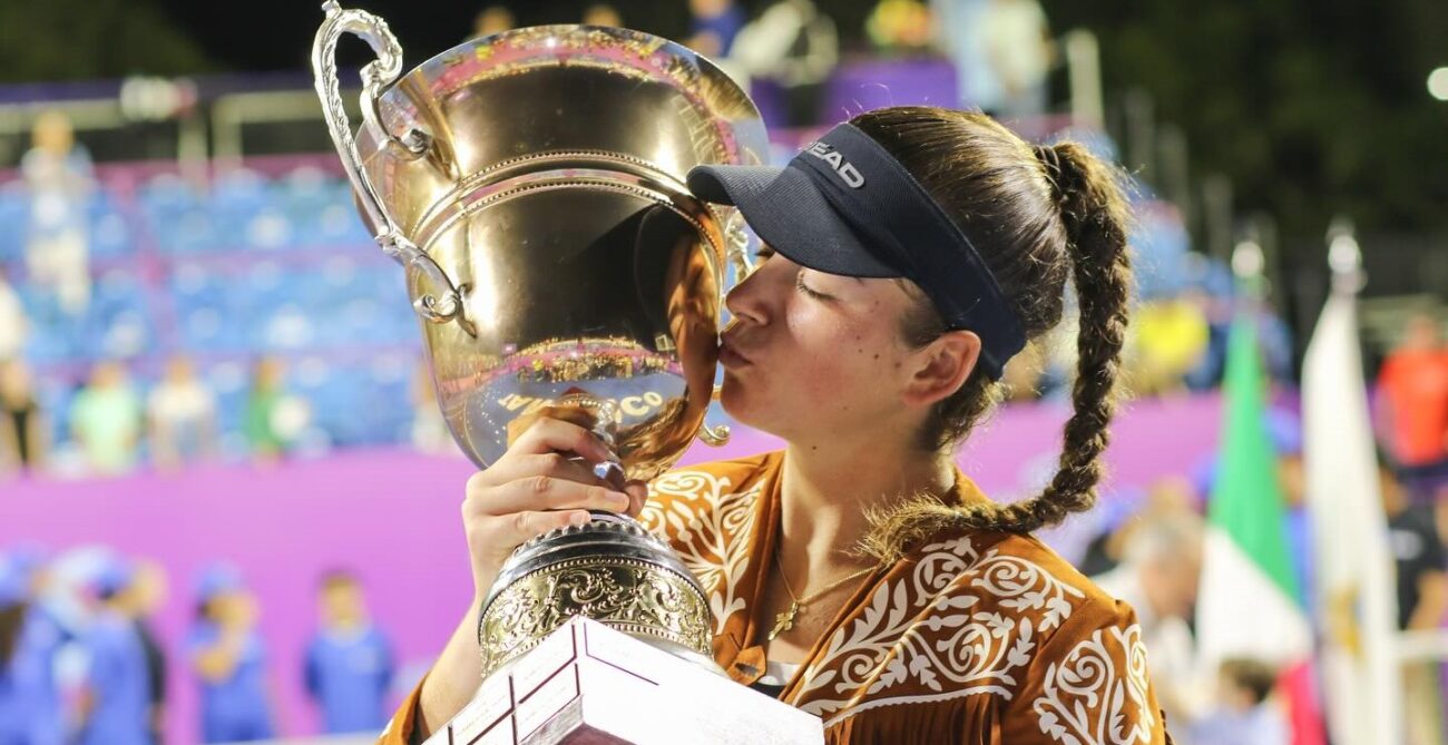 Marina Stakusic kisses the trophy in Tampico, Mexico.