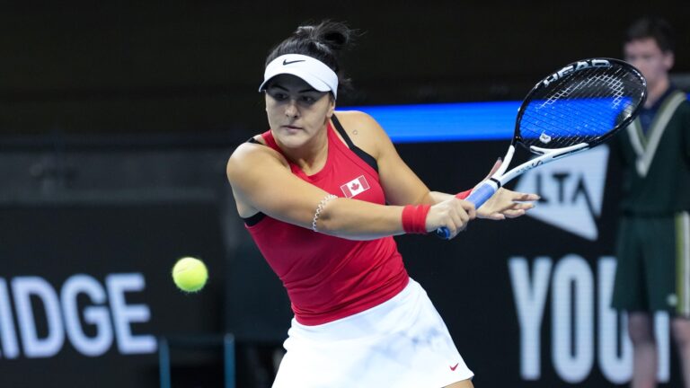 Bianca Andreescu winds up to hit a backhand at the Billie Jean King Cup.