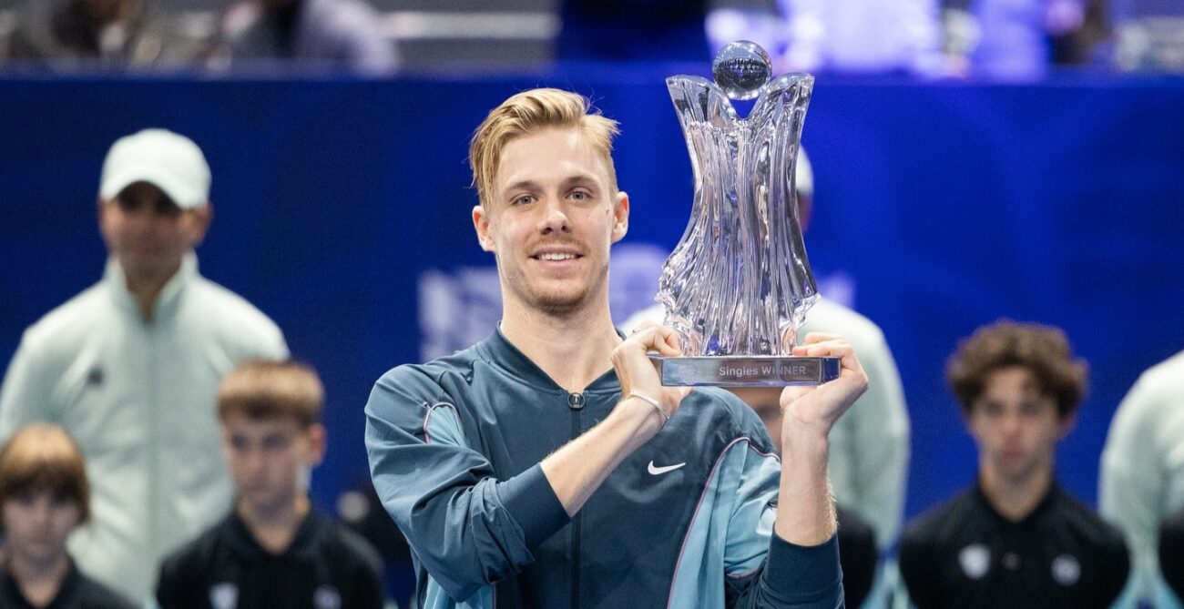 Denis Shapovalov holds up the trophy in Belgrade after beating Hamad Medjedovic.