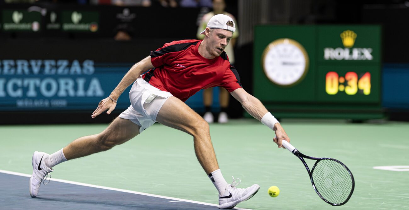 Denis Shapovalov reaches for a forehand during his loss to Jan-Lennard Struff, just like in 2022, at the Davis Cup Finals against Germany.