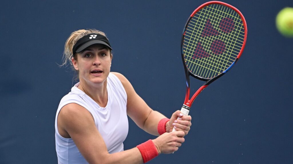 Gabriela Dabrowski looks at a ball and winds up to hit it. She and Erin Routliffe are the second seeds at the WTA Finals this week.