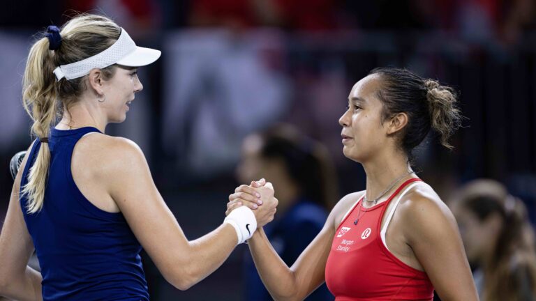 Leylah Fernandez (right) shakes hands with Katie Boulter (left) after Canada lost to Great Britain at the Billie Jean King Cup Finals on Sunday in Malaga.