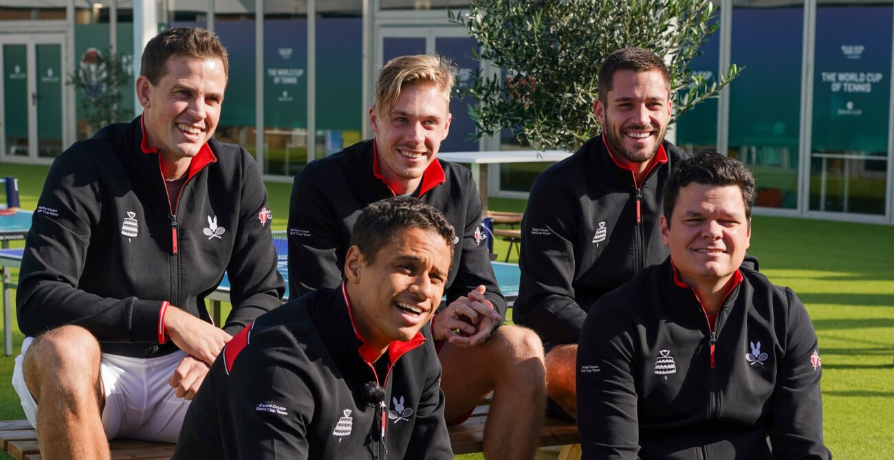 Back row: (from left to right) Vasek Pospisil, Denis Shapovalov, Alexis Galarneau. Front row: Gabriel Diallo (left) and Milos Raonic (Right). The members of Team Canada at the Davis Cup sit on a bench in the sun ahead of their tie with Germany.