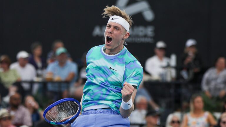 Denis Shapovalov pumps his fist and yells. He won his opening match at the Australian Open on Tuesday but Rebecca Marino was defeated.