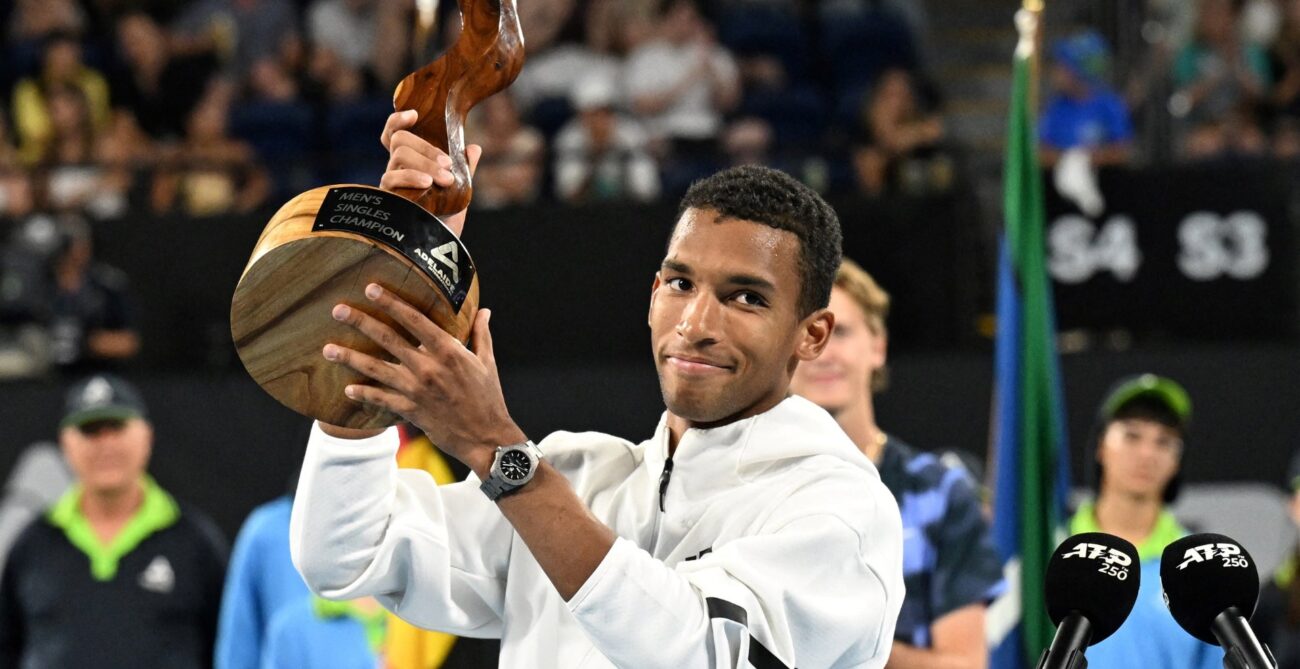 Felix Auger-Aliassime lifts the trophy in Adelaide. He was one of five Canadians to win a title in the second week of 2025.