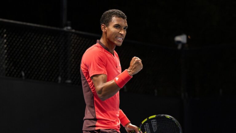 Felix Auger-Aliassime pumps his fist. He beat Yunchaokete Bu in Montpellier on Friday.