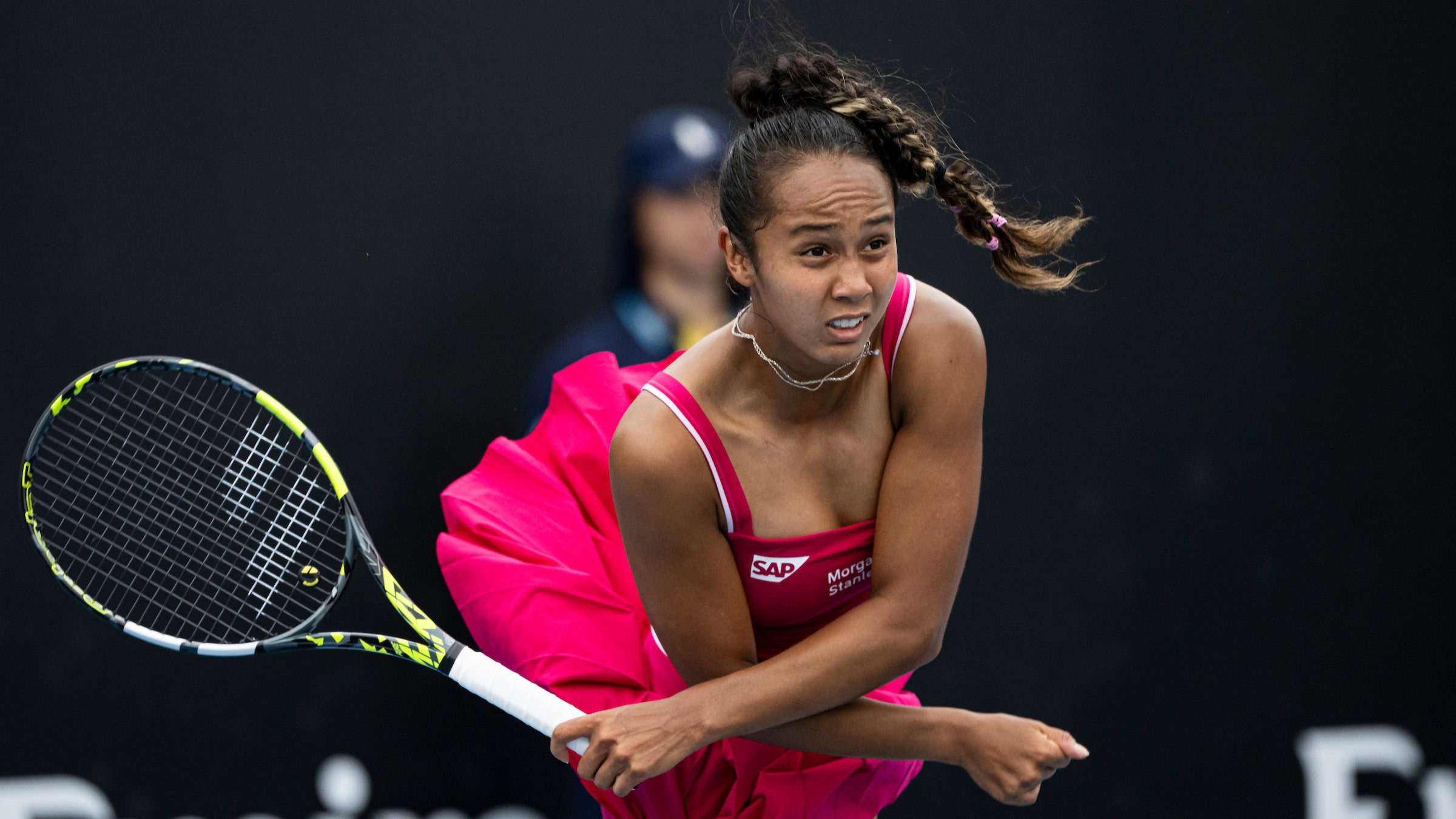 Leylah Fernandez follows through on a serve at the Australian Open. She lost to Coco Gauff on Friday.