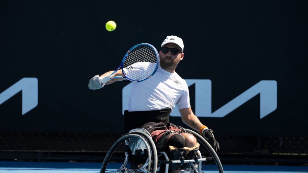 Rob Shaw hits a backhand at the Australian Open.