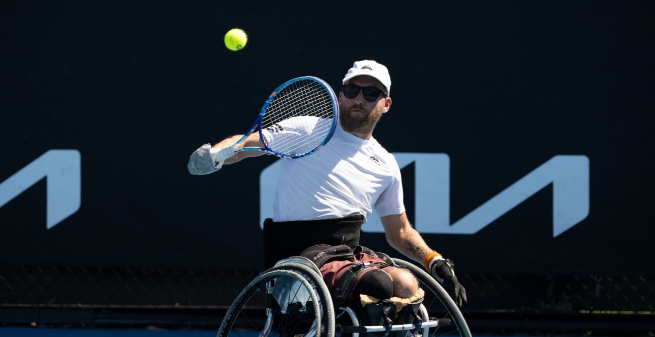 Rob Shaw hits a backhand at the Australian Open.