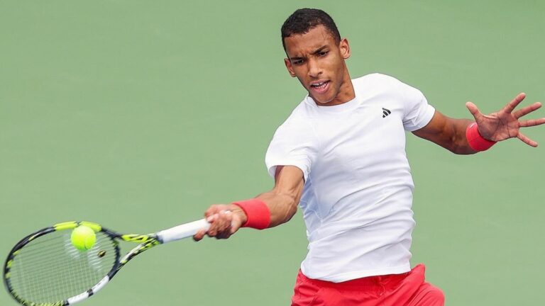 Felix Auger-Aliassime hits a forehand in Dubai. He beat Quentin Halys in the semifinals on Friday.