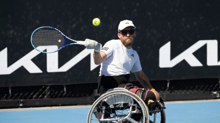 Rob Shaw hits a forehand in his wheelchair singles match at the 2025 Australian Open.