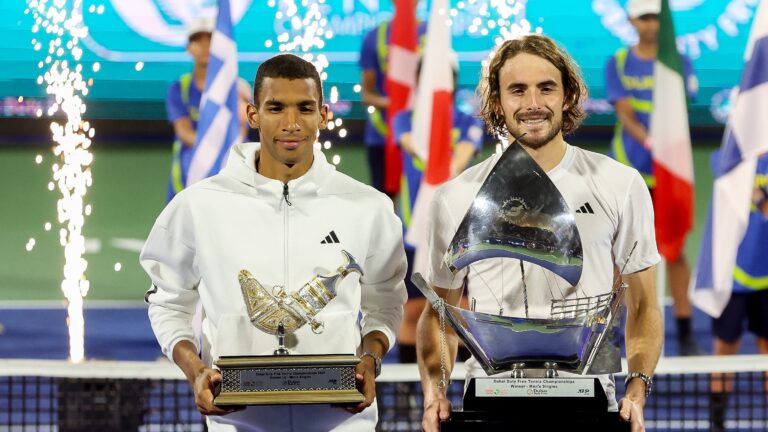 Felix Auger-Aliassime (left) and Stefanos Tsitsipas (right) hold their trophies in Dubai. Auger-Aliassime and Denis Shapovalov both had big results ahead of Indian Wells this week.