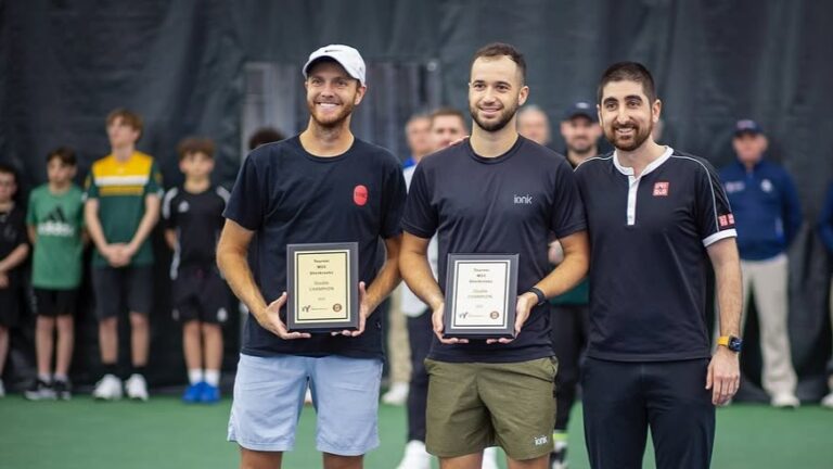 Dan Martin and his doubles partner pose with their trophy in Sherbrooke, one of two ITF events in Canada along with Trois-Rivieres last week.