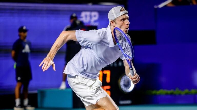 Denis Shapovalov runs down a shot. He lost to Carlos Alcaraz in Indian Wells on Monday, becoming the last Canadian eliminated.