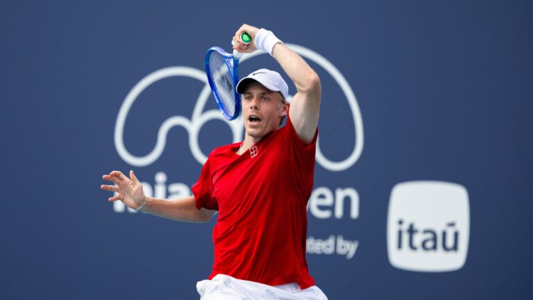 Denis Shapovalov follows through on a forehand in Miami. He lost to Taylor Fritz on Monday.