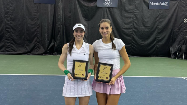 Christina McHale (left) and Raphaelle Lacasse (right) hold their trophy plaques after winning the ITF event in Montreal.