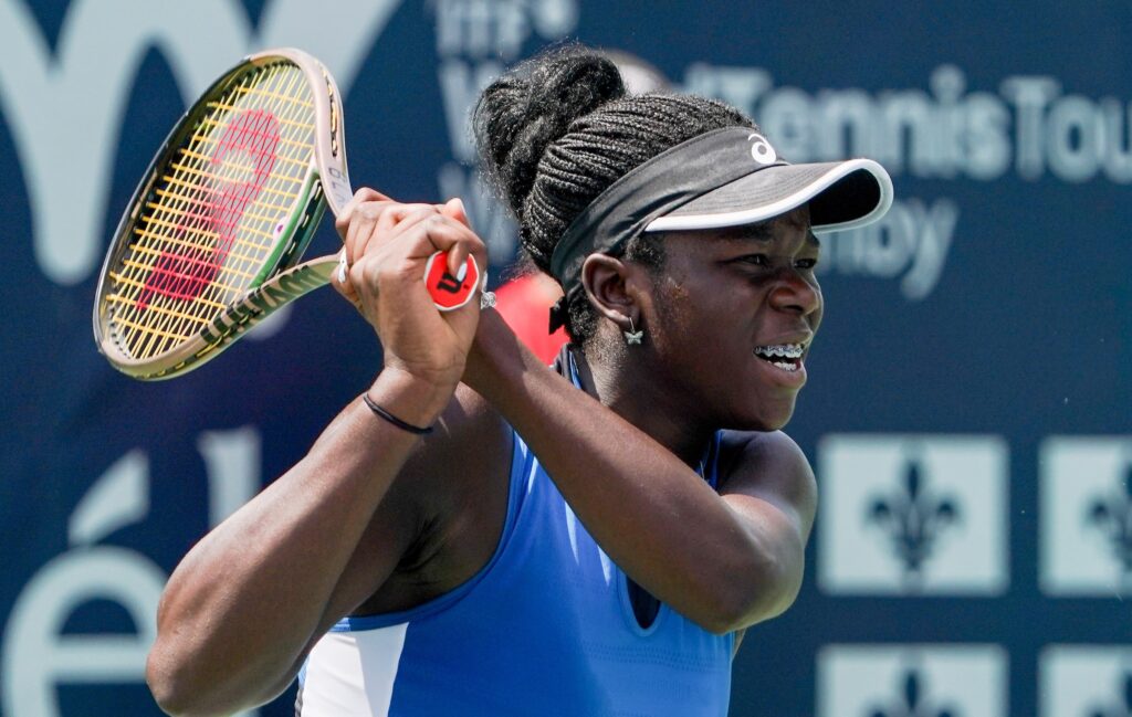 Victoria Mboko follows through on a backhand. She won her first WTA match in Miami on Wednesday.